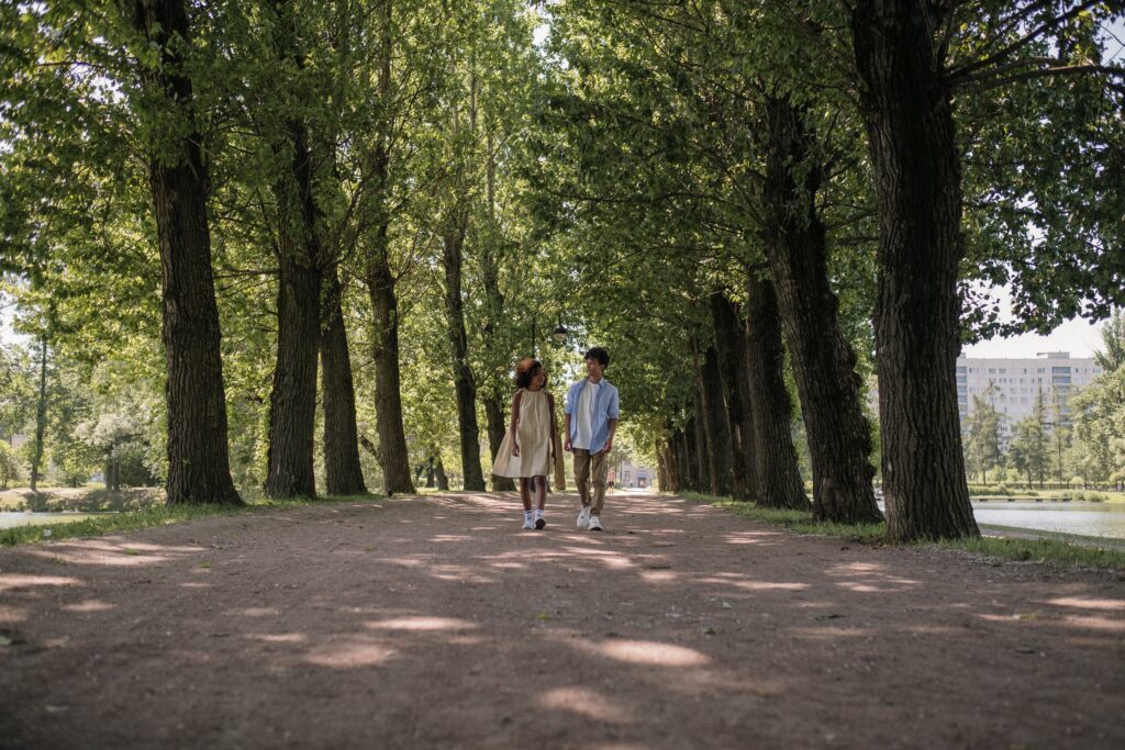 Couple having a happy and memorable first date by going on a walk